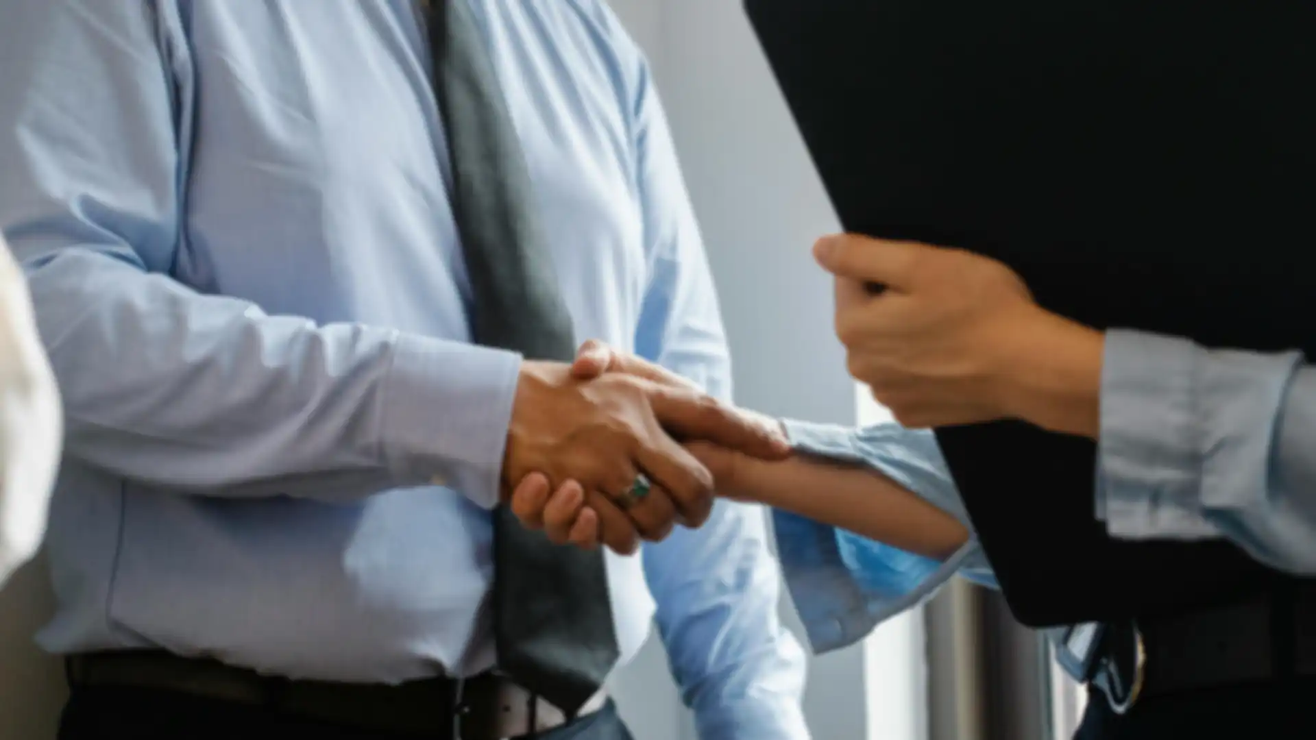 Business people shaking hands